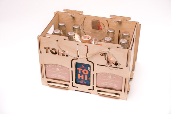 Tohi Cloudberry Mist Gin in a stylish plywood gift box with a glass
